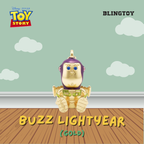 A gold Buzz Lightyear pendant charm from Disney Pixar Toy Story, displayed against a light green wall with white clouds and a wooden floor. The image features the 'Disney Pixar Toy Story' logo on the top left, 'BLINGTOY' on the top right, and 'BUZZ LIGHTYEAR (GOLD)' on the bottom.
