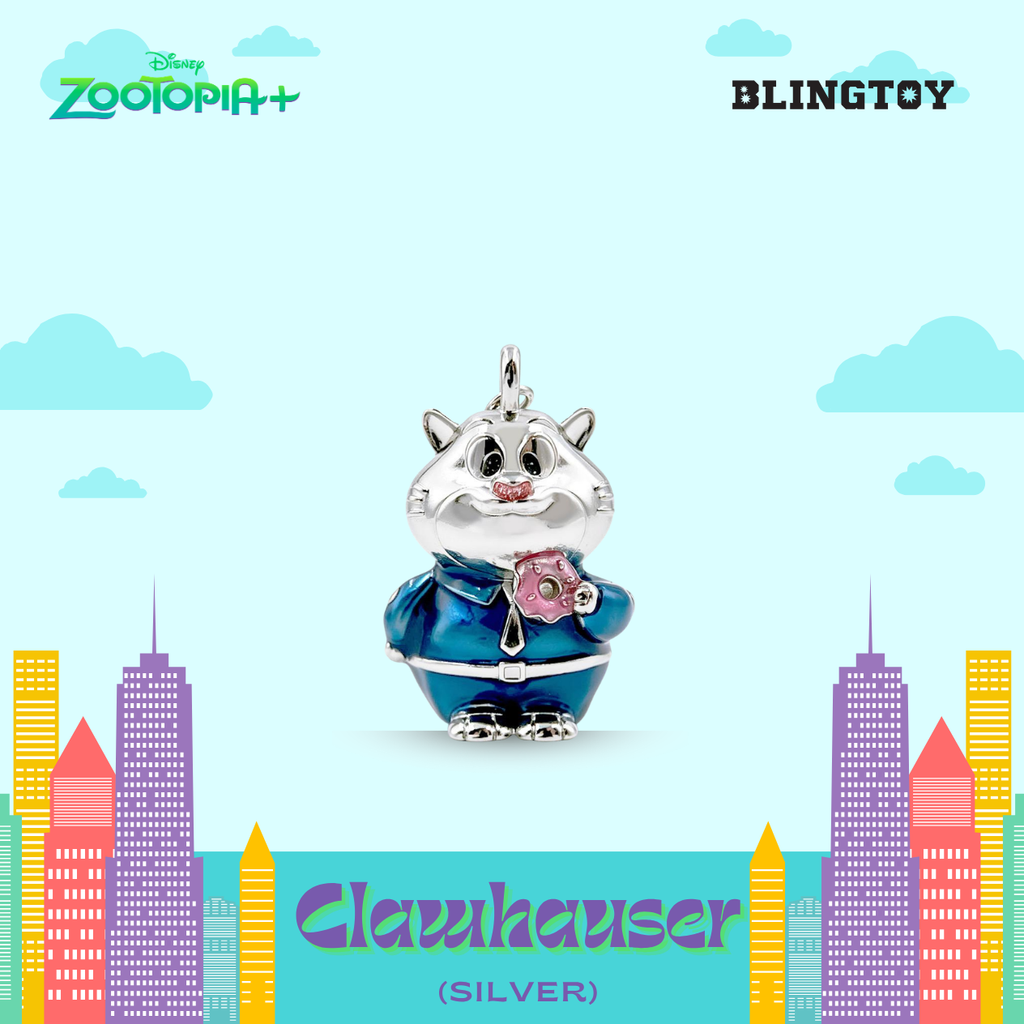 A silver Clauhauser character pendant charm from Disney Zootopia+ and Blingtoy, featuring a silver cat in a blue outfit with a pink gem, set against a stylized light blue sky and cityscape background.