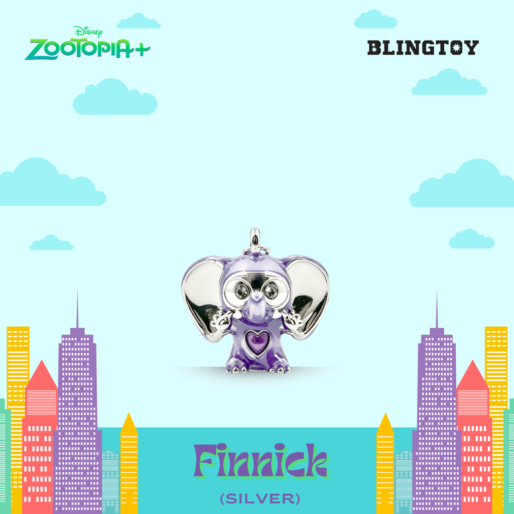 A silver and purple elephant charm pendant labeled 'Finnick (SILVER)' from Blingtoy Disney Zootopia+, shown against a stylized light blue sky background with clouds and colorful city buildings.