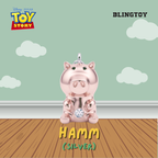 A metallic silver pig-shaped charm pendant inspired by Disney Pixar's Toy Story, featuring a small crystal gem on its belly, shown against a stylized background with a light green sky, white clouds, and a wooden floor. Text overlays include 'BLINGTOY', 'HAMM (SILVER)', and the Toy Story logo.
